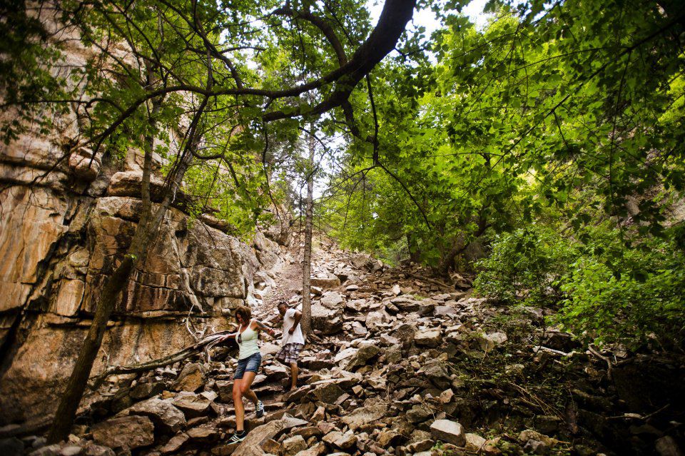 Hikers descend the steep trail from Hanging Lake in Glenwood Canyon